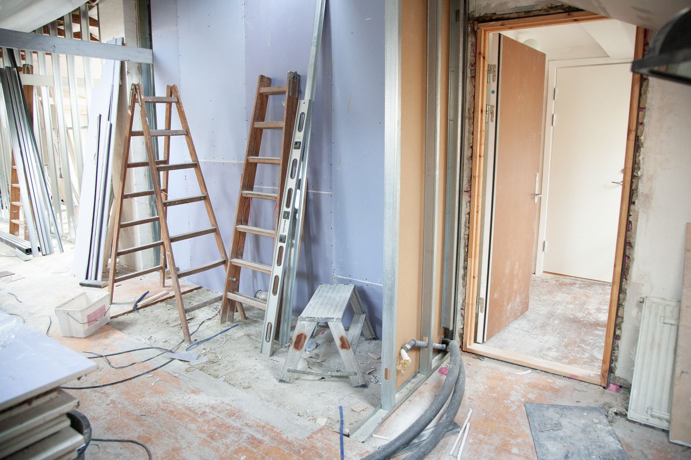 A room mid-refurbishment, stripped back and prepared before finishing